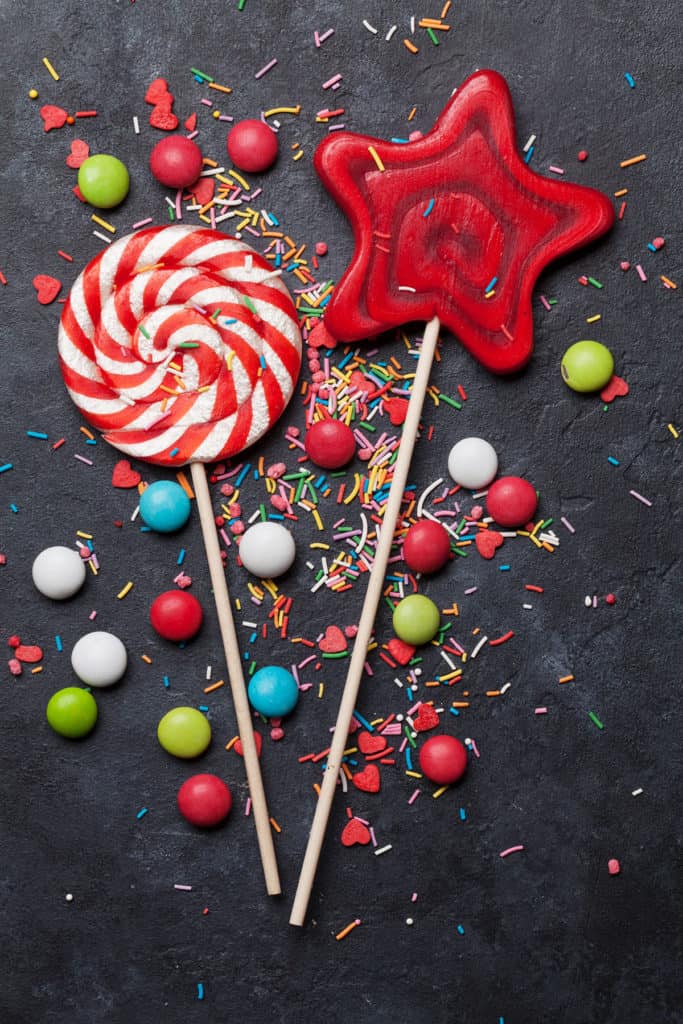 Colorful sweets. Lollipops and candies. Top view