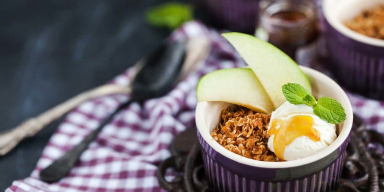 Apple crumble dessert with vanilla ice cream