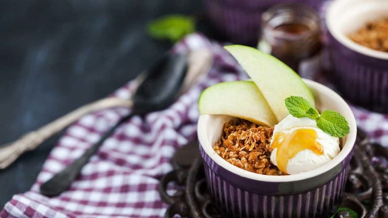 Apple crumble dessert with vanilla ice cream