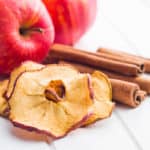 Dried apple slices and cinnamon.
