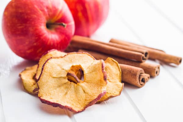 Dried apple slices and cinnamon.
