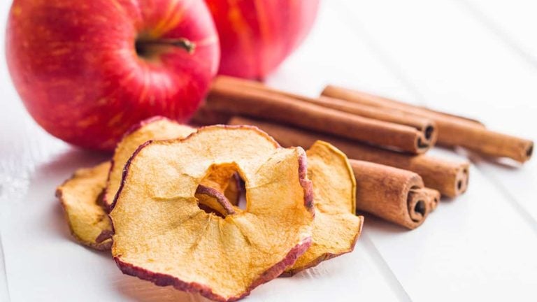 Dried apple slices and cinnamon.