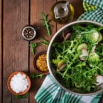 Ingredients for Salad arugula, radish, cucumber and spices. Top