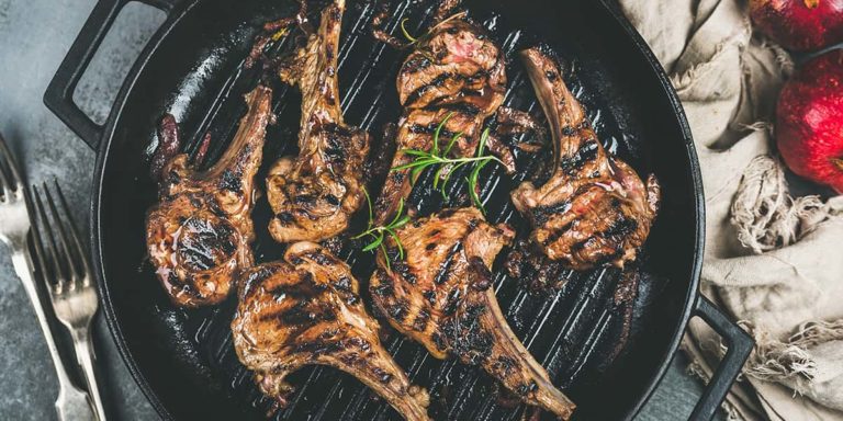 Barbecue dinner with grilled lamb meat chops in pan