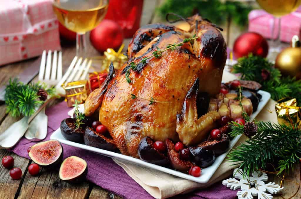 Roasted chicken with figs, cranberries and garlic for Christmas