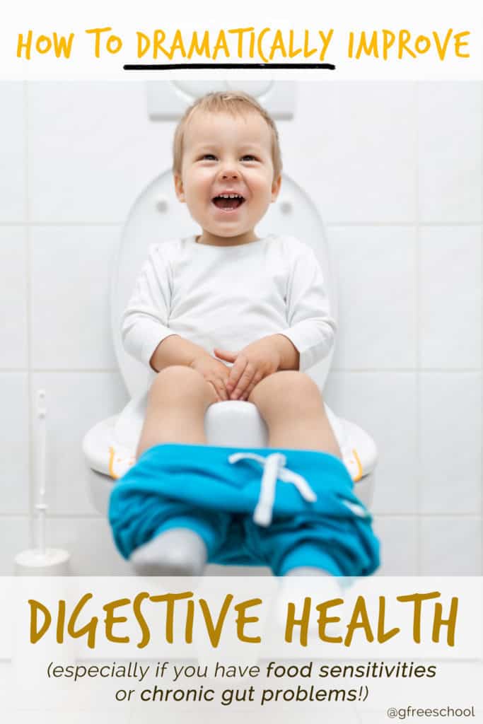 Adorable young child sitting on the toilet