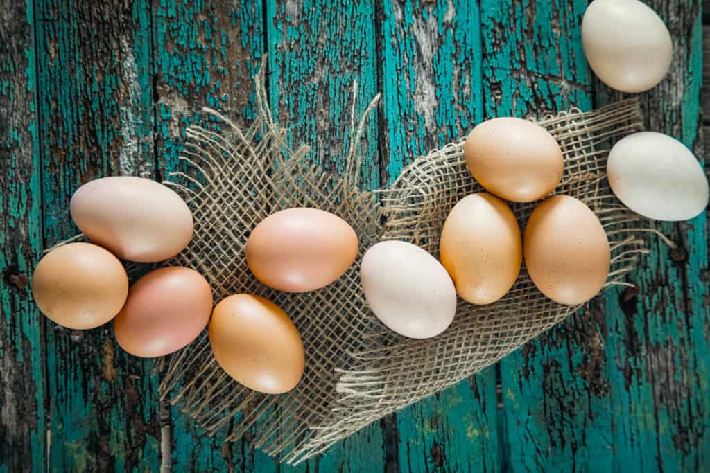 Organic eggs on wood