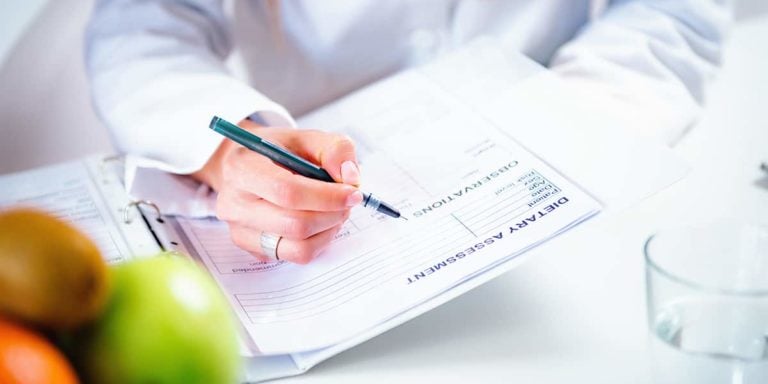 Nutritionist with female patient