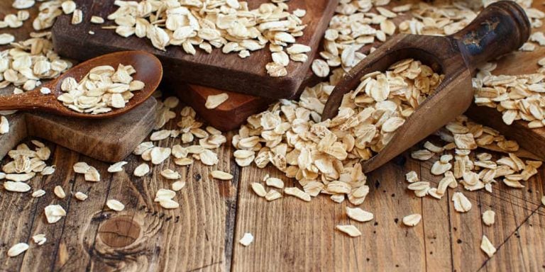 Rolled oats on a wooden table