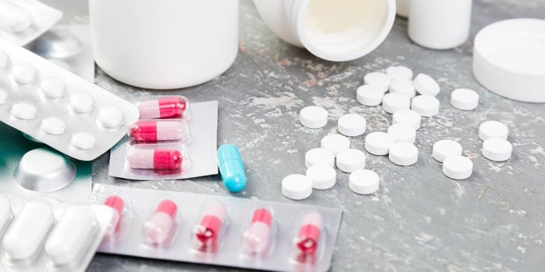 Pills. Medicine Pills in blister pack. Tablets and bottle.