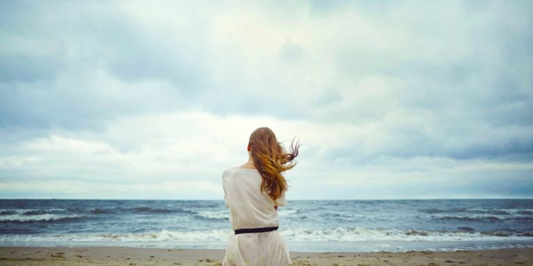 beautiful alone sensual girl on the beach
