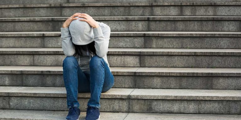 Upset woman with Fibromyalgia