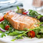 Salmon steak with salad