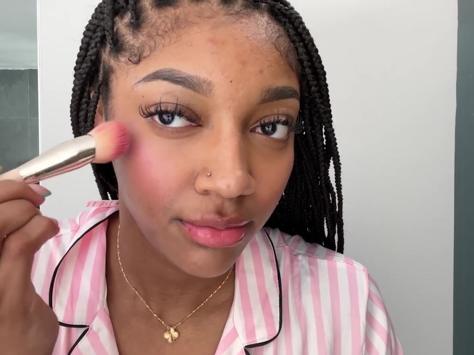 Angel Reese Reveals the K-Beauty Staple She Keeps on the Bench During WNBA Games