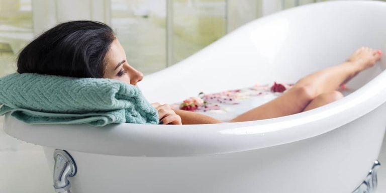 Woman taking bath for skin